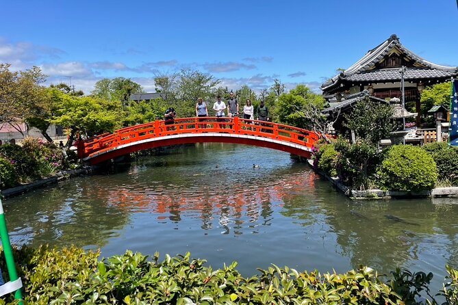 Discover Kyoto by Bike Full Day Tour - Heian Shrine, a Torii Nearby, and the Story Behind the Canal