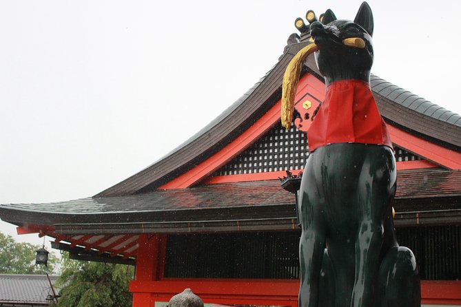 Fushimi Inari Shrine: Explore the 1,000 Torii Gates on an audio walking tour - Getting started: meet the fox statue by Inari Station