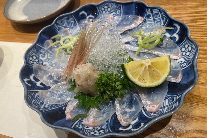Kyoto Night Food & Izakaya Hopping Tour in Pontocho - Stop 2: Pontocho izakaya hopping in the lantern-lit lanes