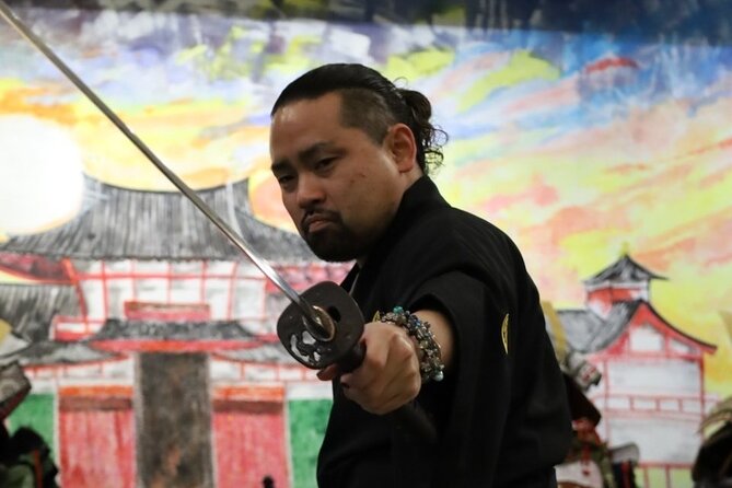 Train Katana with Real Dojo Students in Kyoto - How the cutting show works: rolled tatami, then the master’s two-katana performance
